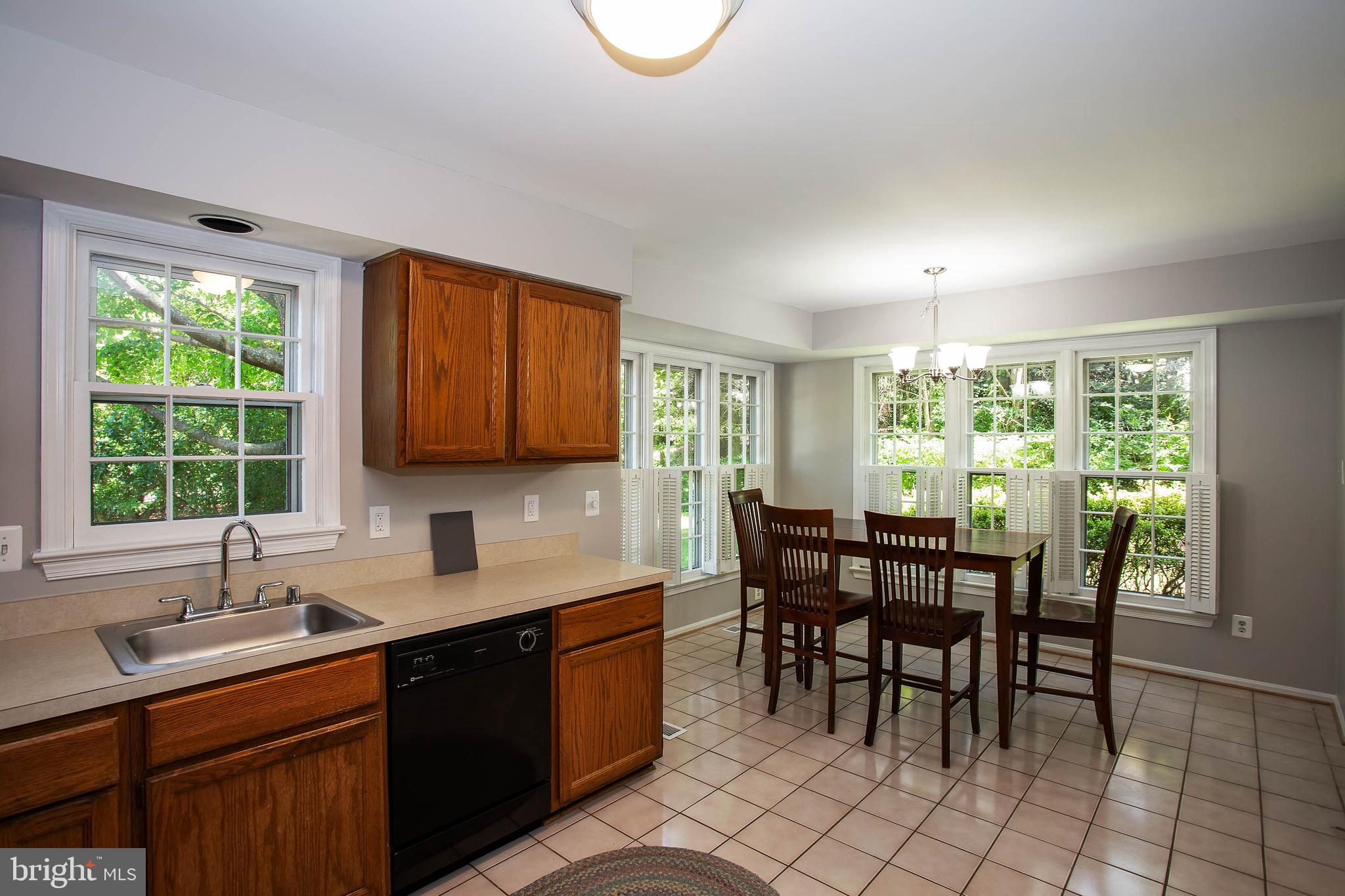 11701 Old Bayberry Lane Reston, VA 20194 - Photo 13 of 36 window over sink overlooks private front yard