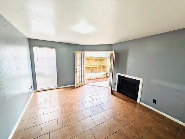 a view of a livingroom with a fireplace