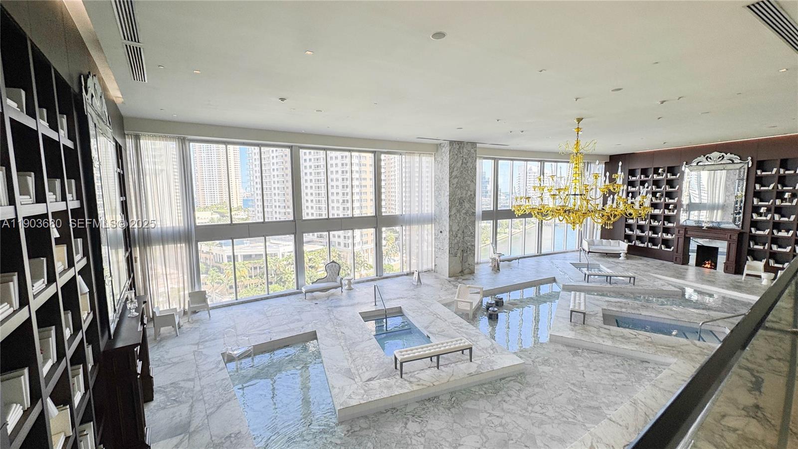 465 Brickell Avenue, Unit 1705 Miami, FL 33131 - Photo 22 of 34 a living room with furniture and a large window