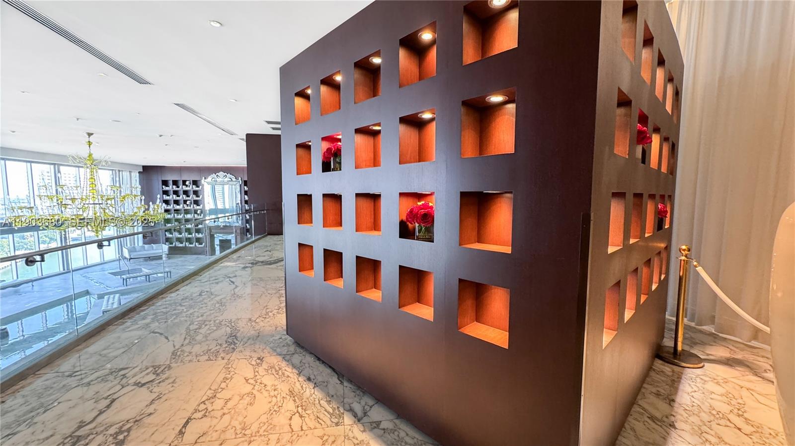 465 Brickell Avenue, Unit 1705 Miami, FL 33131 - Photo 23 of 34 a hallway with windows