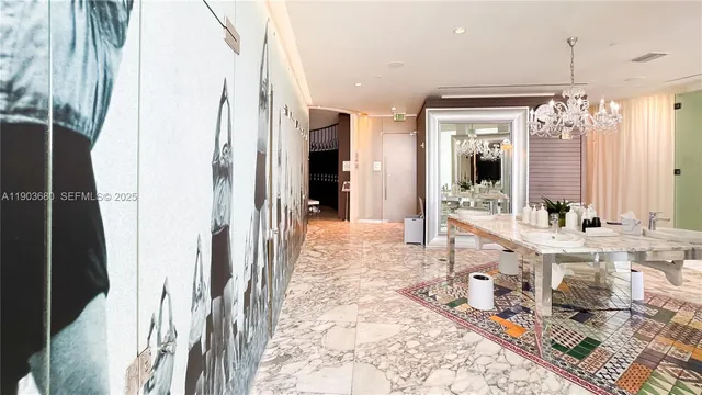 a view of a hall with a floor to ceiling window and a room