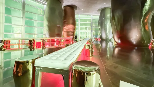 a view of a park with a palm tree