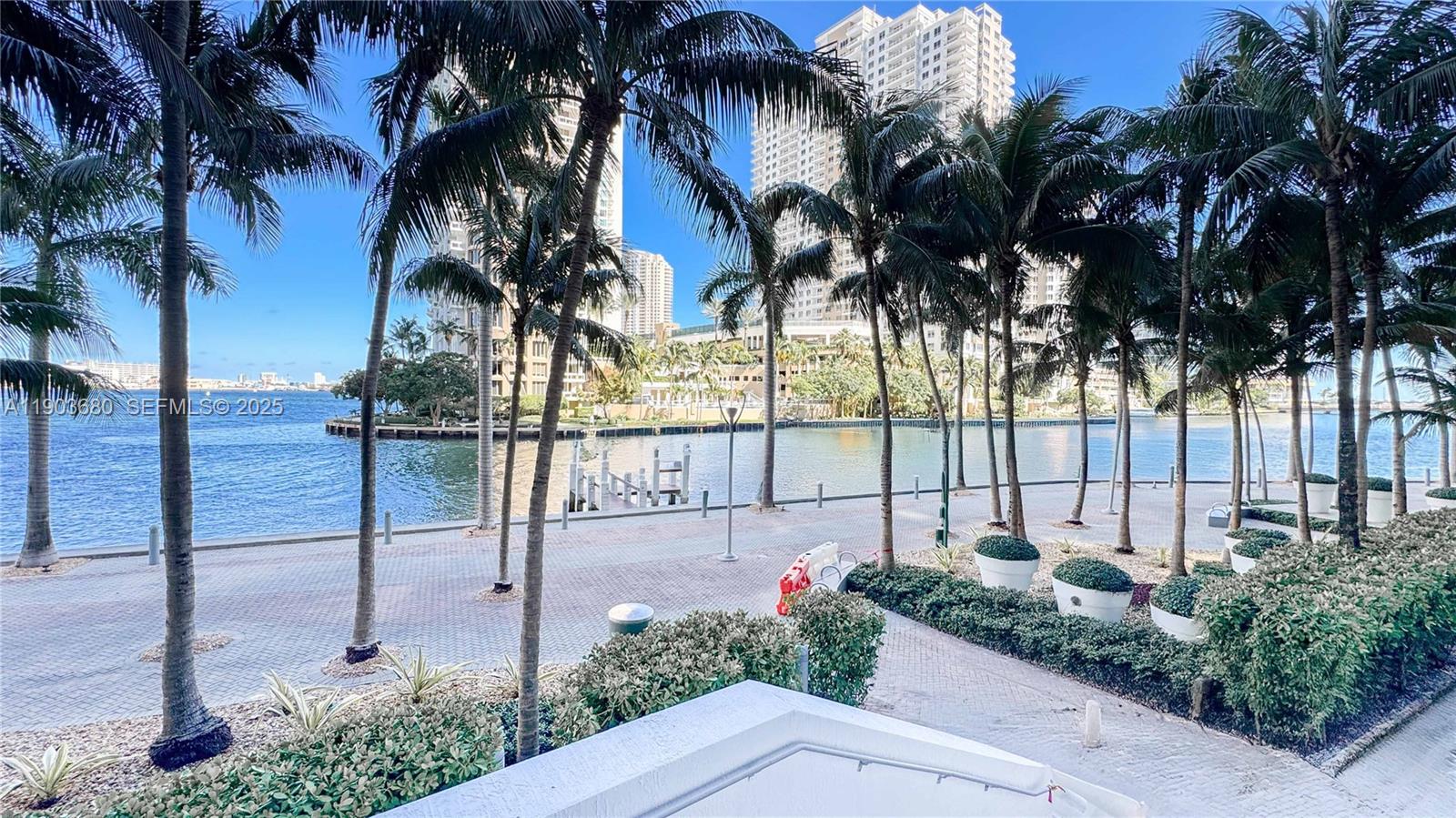 465 Brickell Avenue, Unit 1705 Miami, FL 33131 - Photo 28 of 34 a view of a park with a palm tree