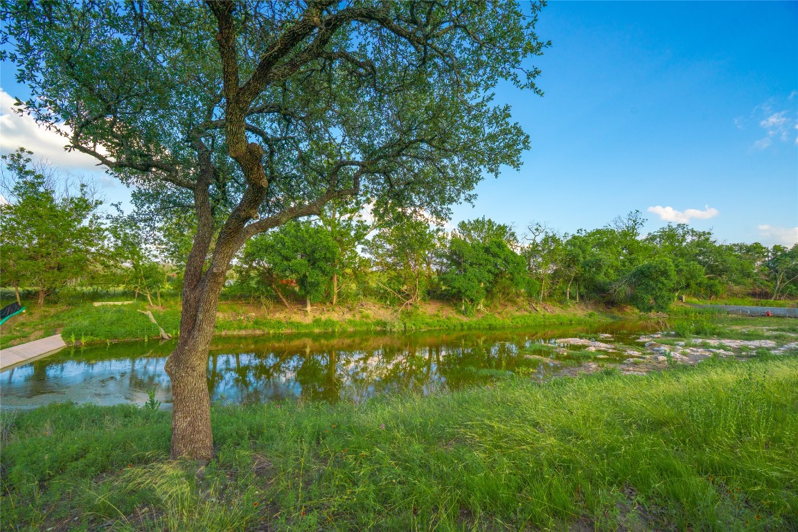 0 Longhorn Ridge Ranch Johnson City, TX 78636 - Photo 4 of 23 a yard with lake view