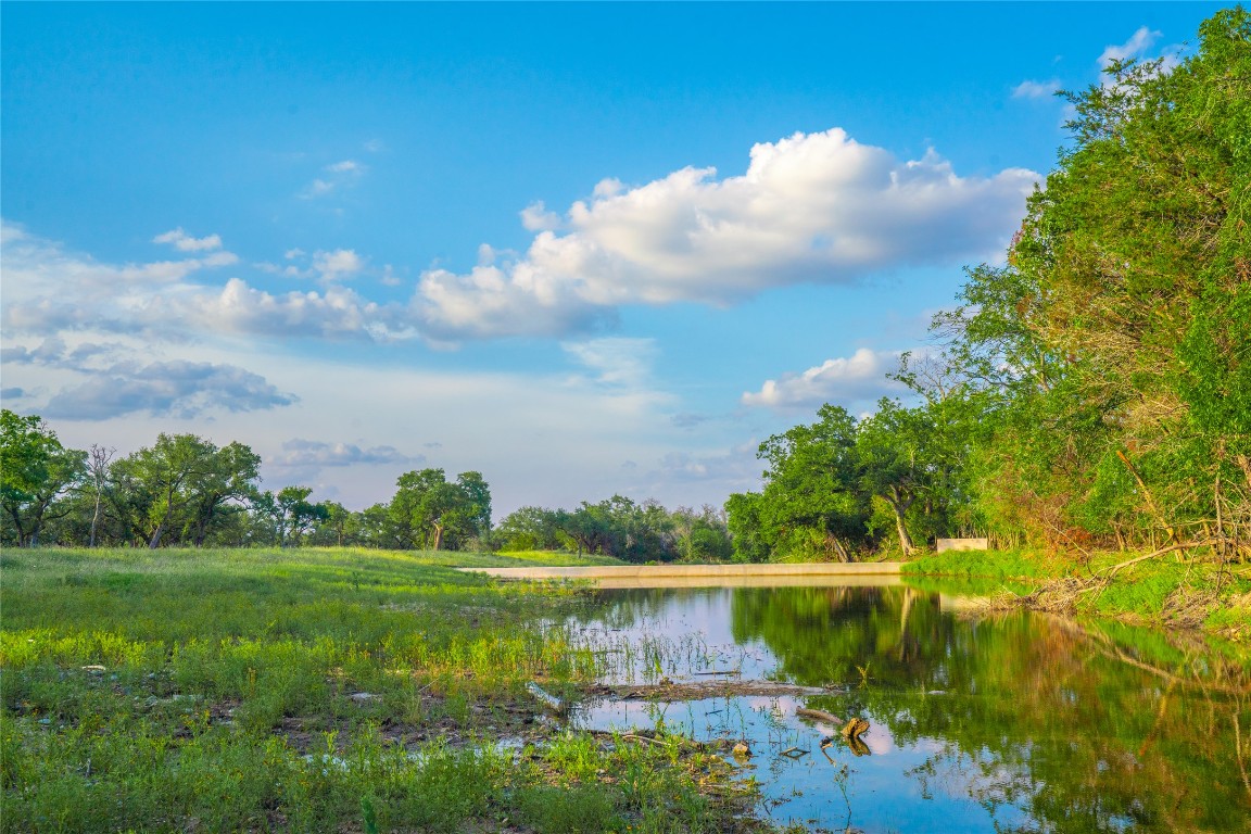 0 Longhorn Ridge Ranch Johnson City, TX 78636 - Photo 6 of 23 a view of a lake with a yard
