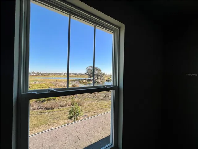 a view of a large window with an outdoor view