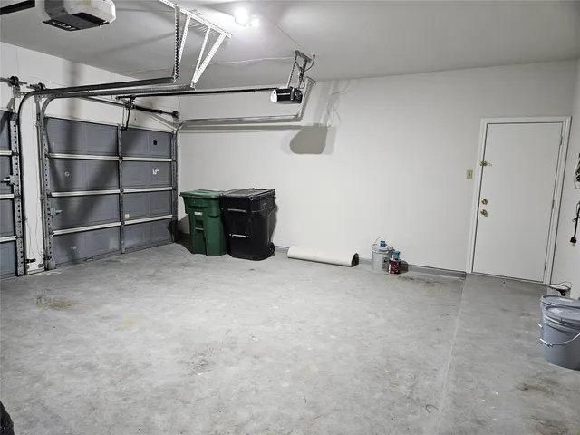 a front view of a house with a garden and porch