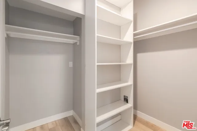 a view of an empty walk in closet