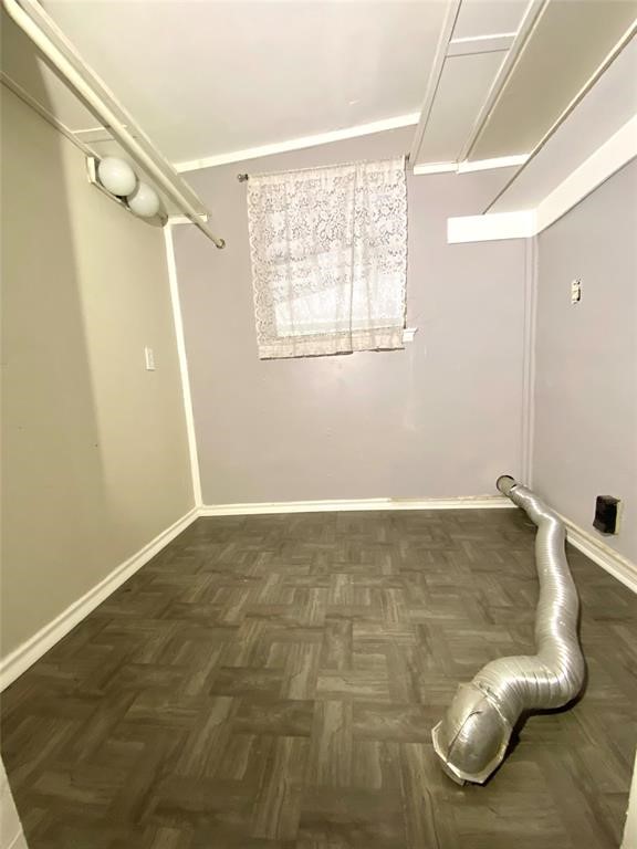 88 Gazebo Street, Unit C Huntsville, TX 77340 - Photo 10 of 12 a view of a big room with wooden floor and windows