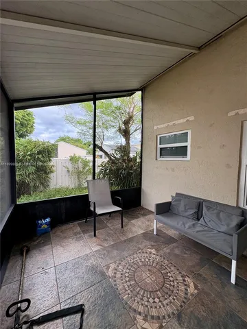 a living room with a large window