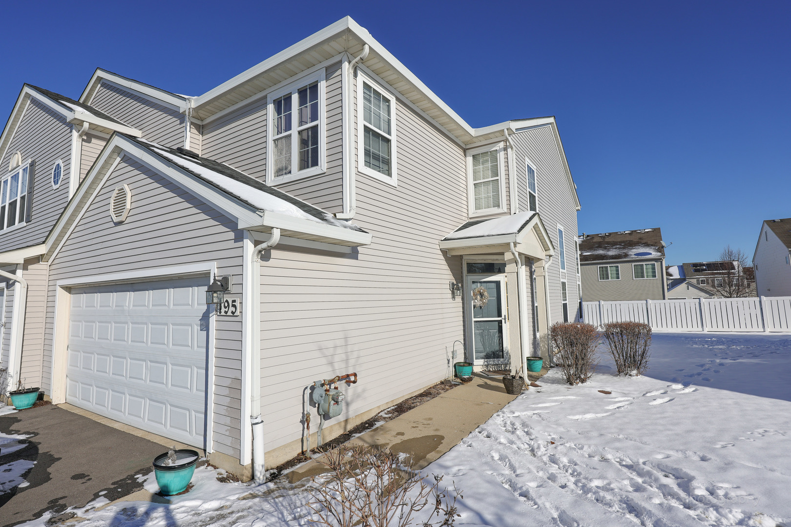 195 Key Largo Drive Romeoville, IL 60446 - Photo 1 of 34 a front view of a house with a yard