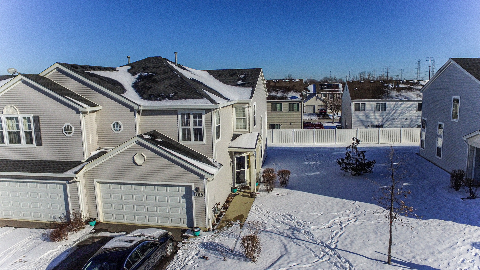 195 Key Largo Drive Romeoville, IL 60446 - Photo 2 of 34 a view of a patio with table and chairs a barbeque