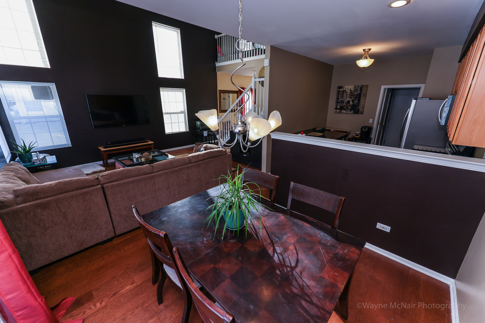 195 Key Largo Drive Romeoville, IL 60446 - Photo 13 of 34 a dining room with furniture and a flat screen tv