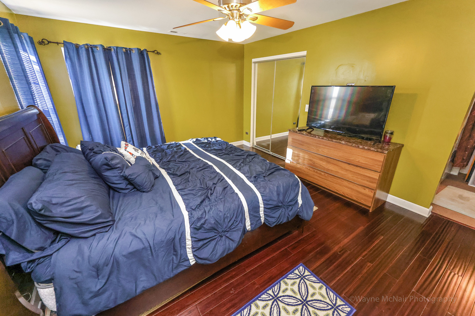 195 Key Largo Drive Romeoville, IL 60446 - Photo 18 of 34 a bedroom with a bed and a flat screen tv
