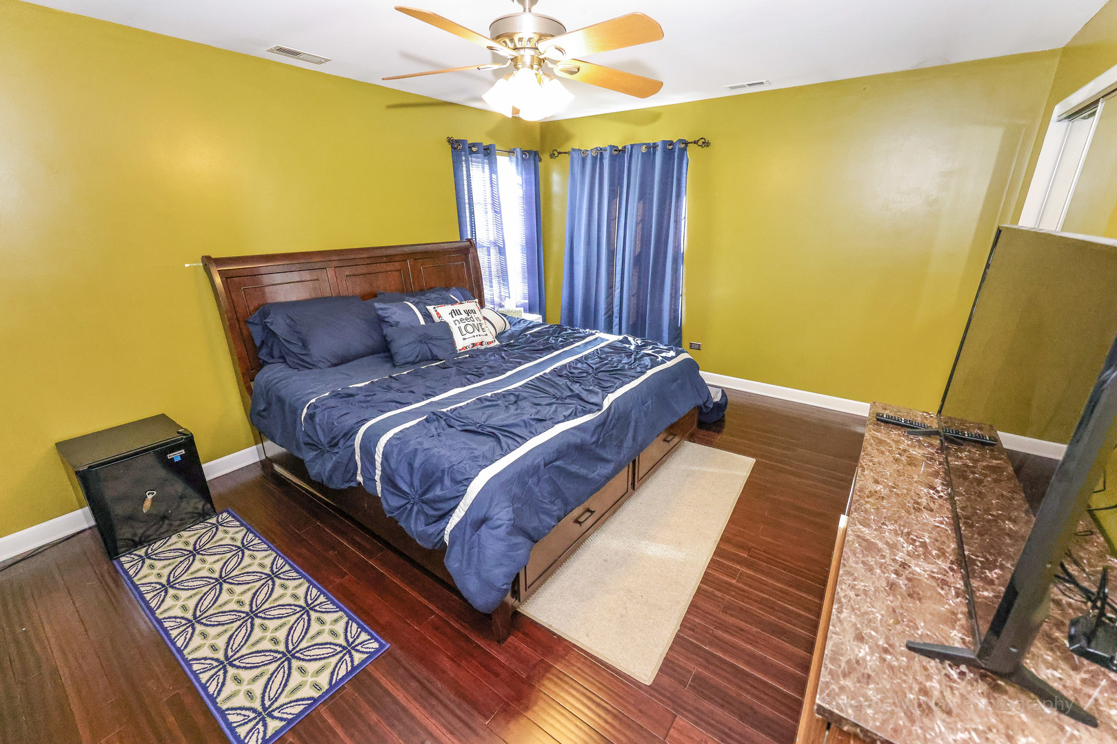 195 Key Largo Drive Romeoville, IL 60446 - Photo 19 of 34 a bed sitting in a bedroom next to a window