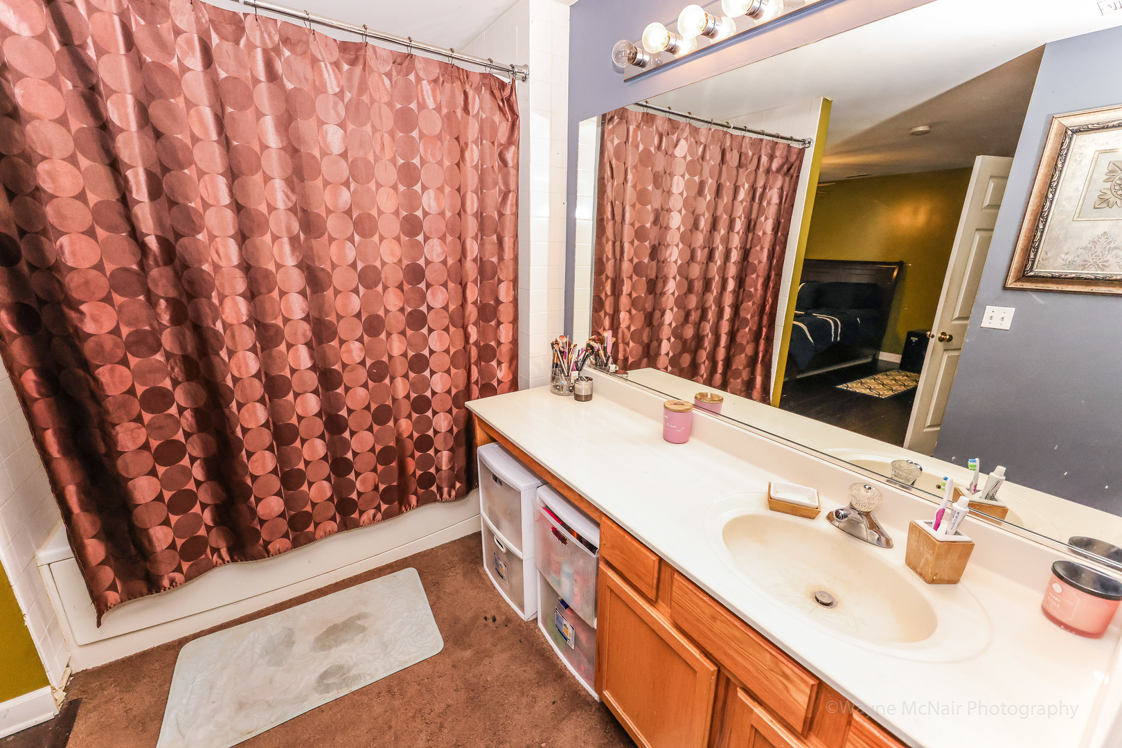 195 Key Largo Drive Romeoville, IL 60446 - Photo 20 of 34 a bathroom with a double vanity sink and mirror