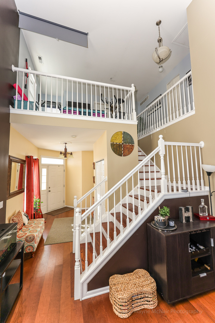 195 Key Largo Drive Romeoville, IL 60446 - Photo 6 of 34 a view of a living room and a balcony
