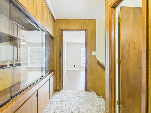 a bathroom with a tub and shower