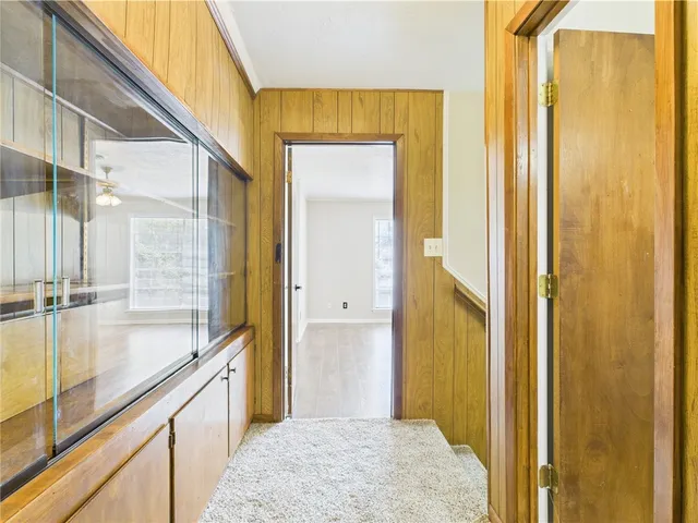 a bathroom with a tub and shower