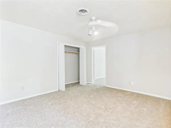 an empty room with a bathroom