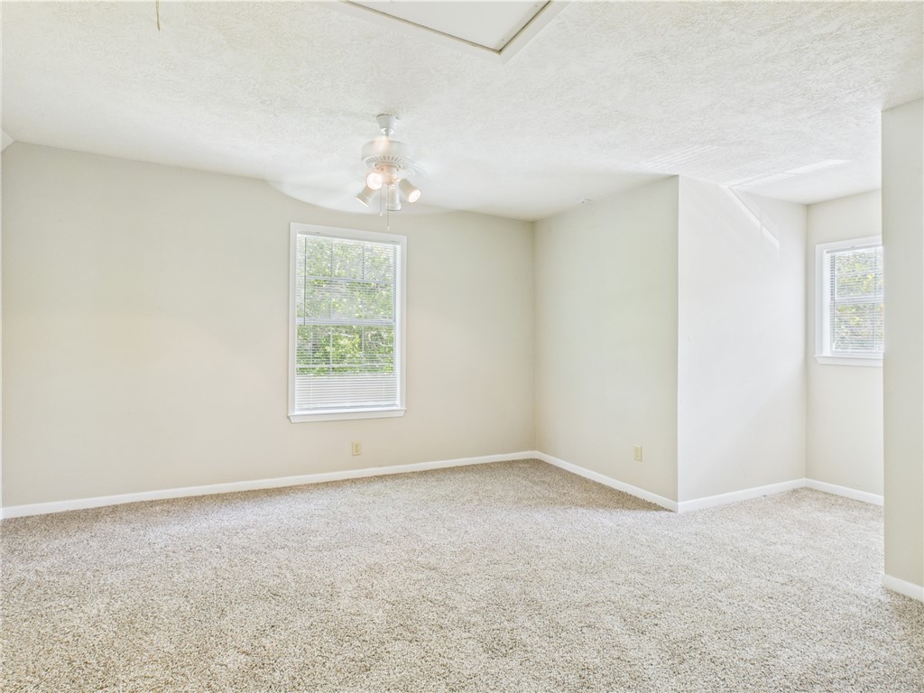 749 Meadow Lane Bryan, TX 77802 - Photo 18 of 47 a view of an empty room with a window
