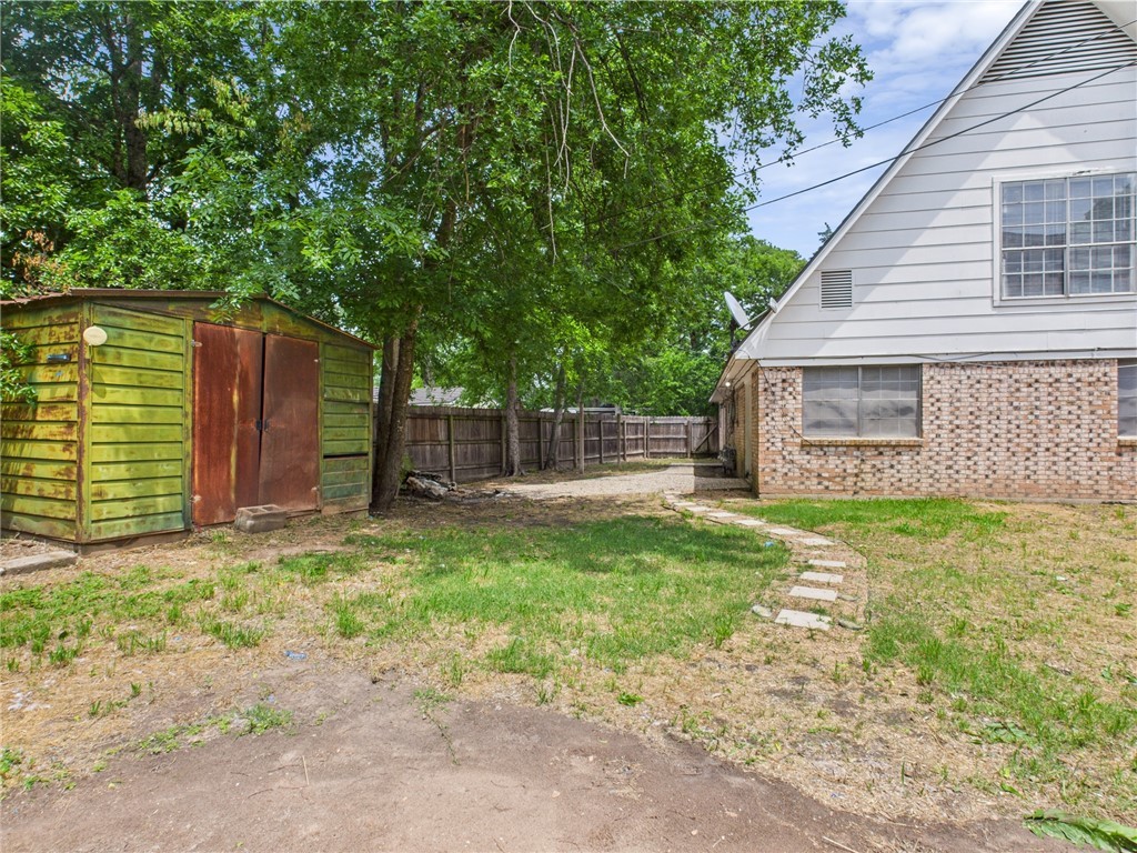 749 Meadow Lane Bryan, TX 77802 - Photo 46 of 47 a view of a house with a backyard