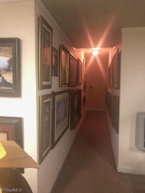 717 Adams Ridge Road State Road, NC 28676 - Photo 22 of 31 Hallway in basement leading to finished area