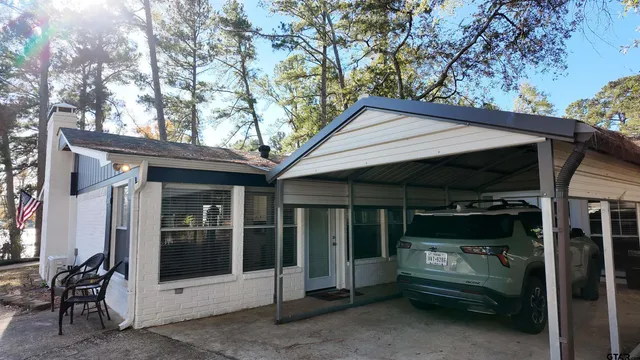 a view of sitting area in front of house