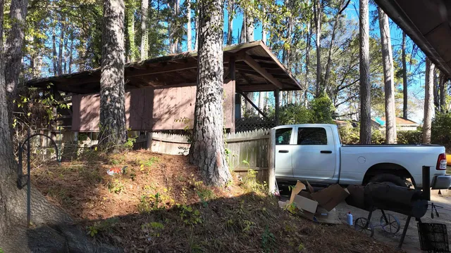 a front view of a house with yard and seating area