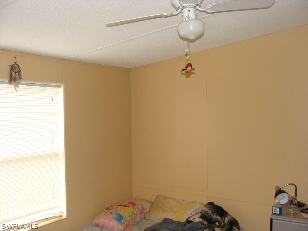 7421 Pinehurst Road Bokeelia, FL 33922 - Photo 2 of 21 a bathroom with a window