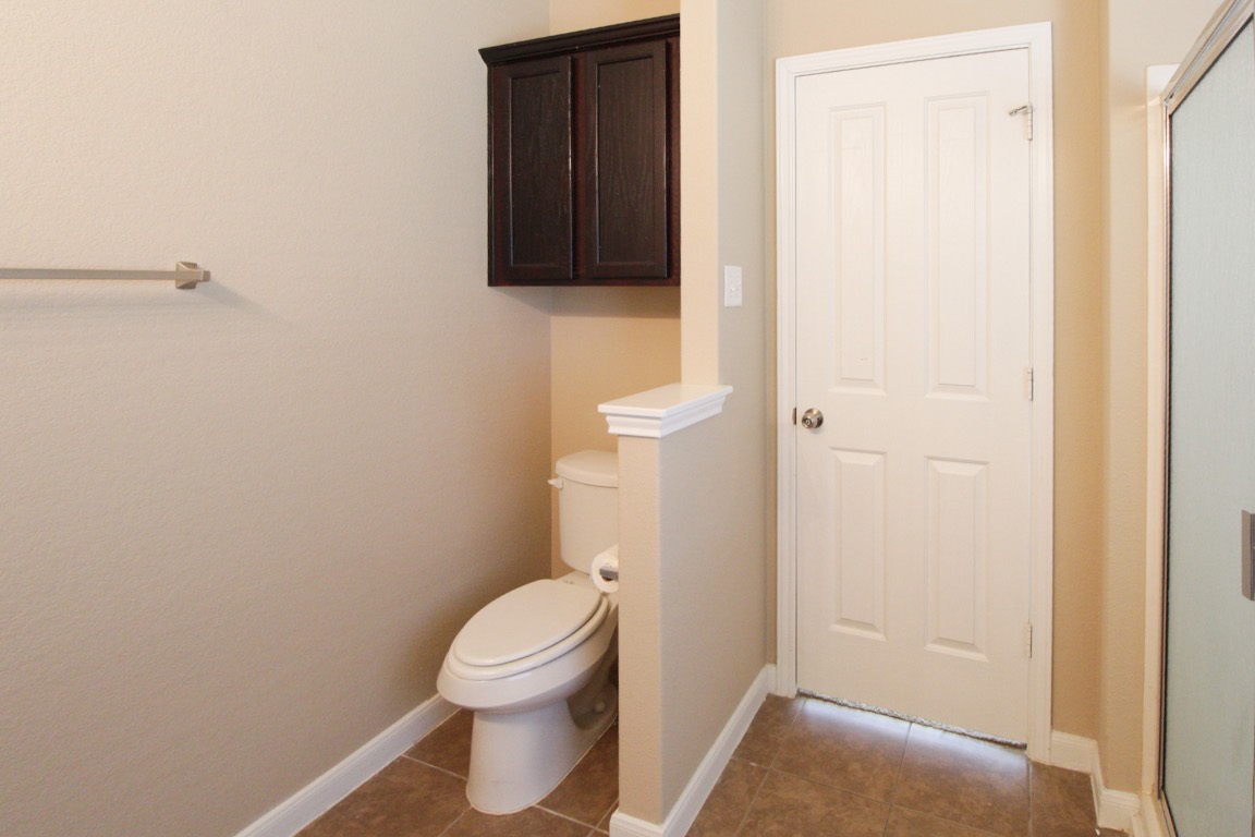 1508 Colton Lane Lockhart, TX 78644 - Photo 12 of 24 Toilet area in the primary bathroom