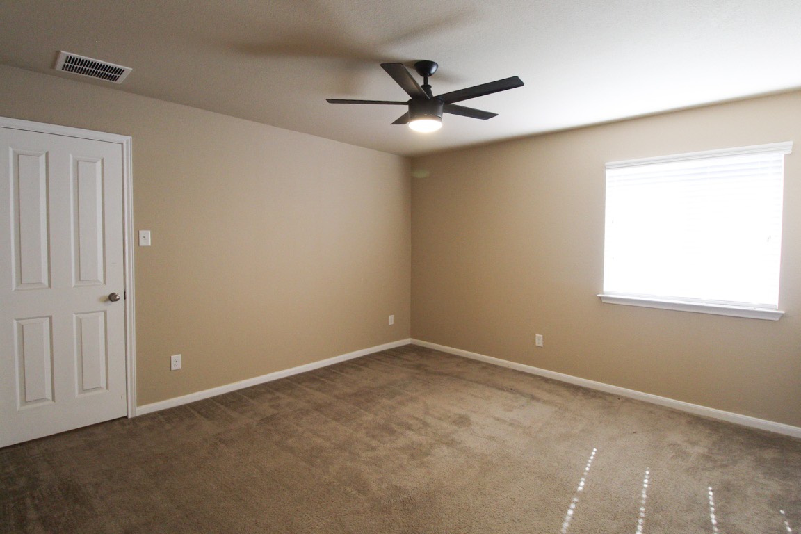 1508 Colton Lane Lockhart, TX 78644 - Photo 13 of 24 Bedroom 2 with the closet door