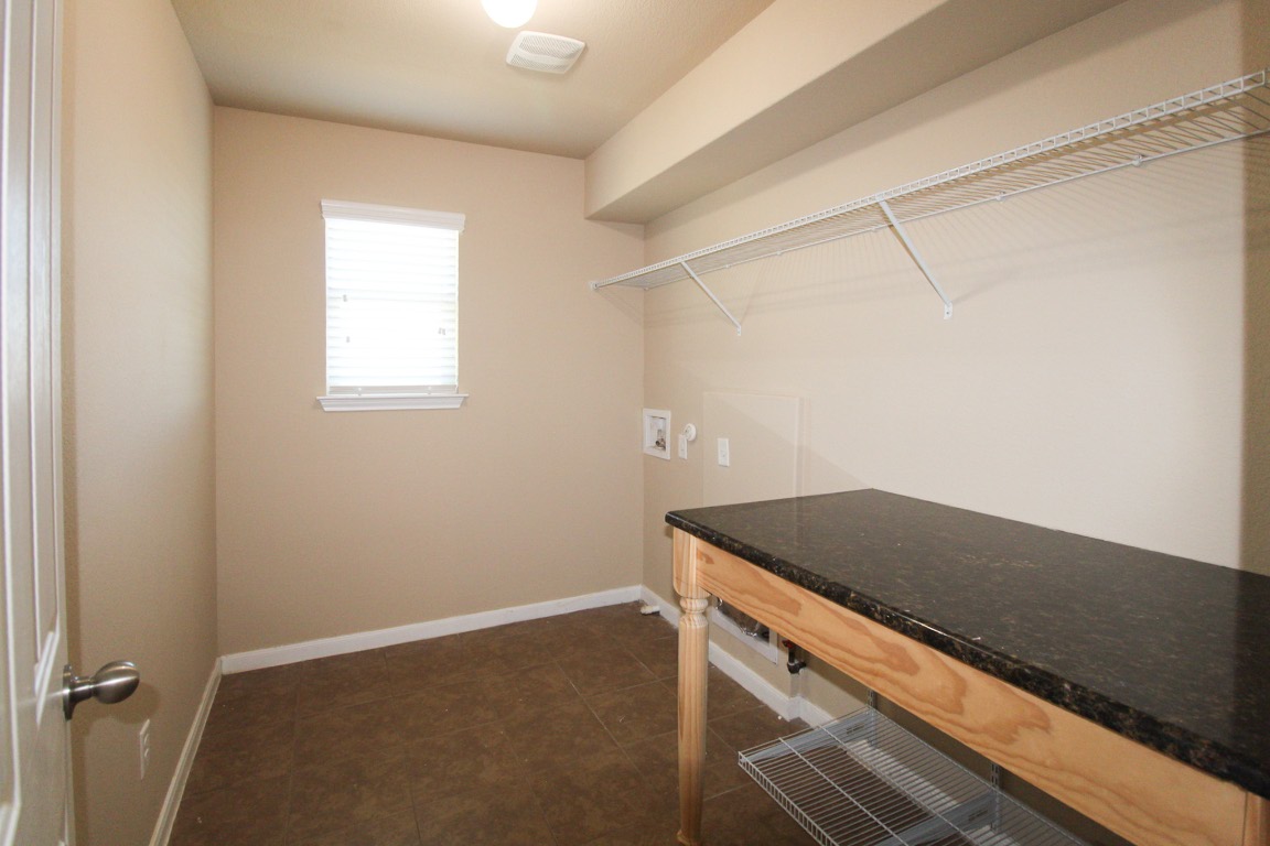 1508 Colton Lane Lockhart, TX 78644 - Photo 18 of 24 Laundry room is locaed upstairs