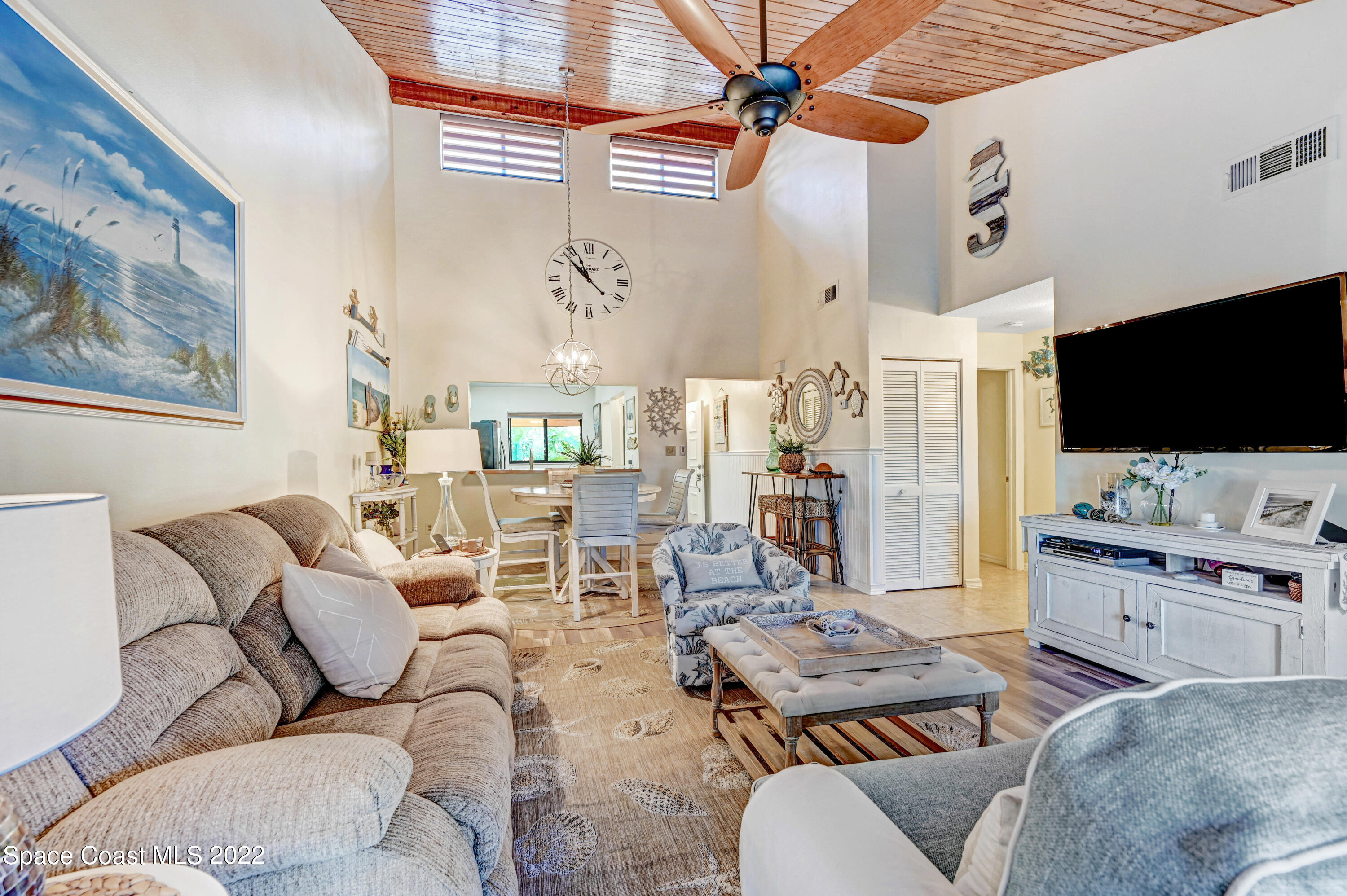 2929 Kirkland Road Northeast Palm Bay, FL 32905 - Photo 15 of 32 a living room with furniture and a flat screen tv