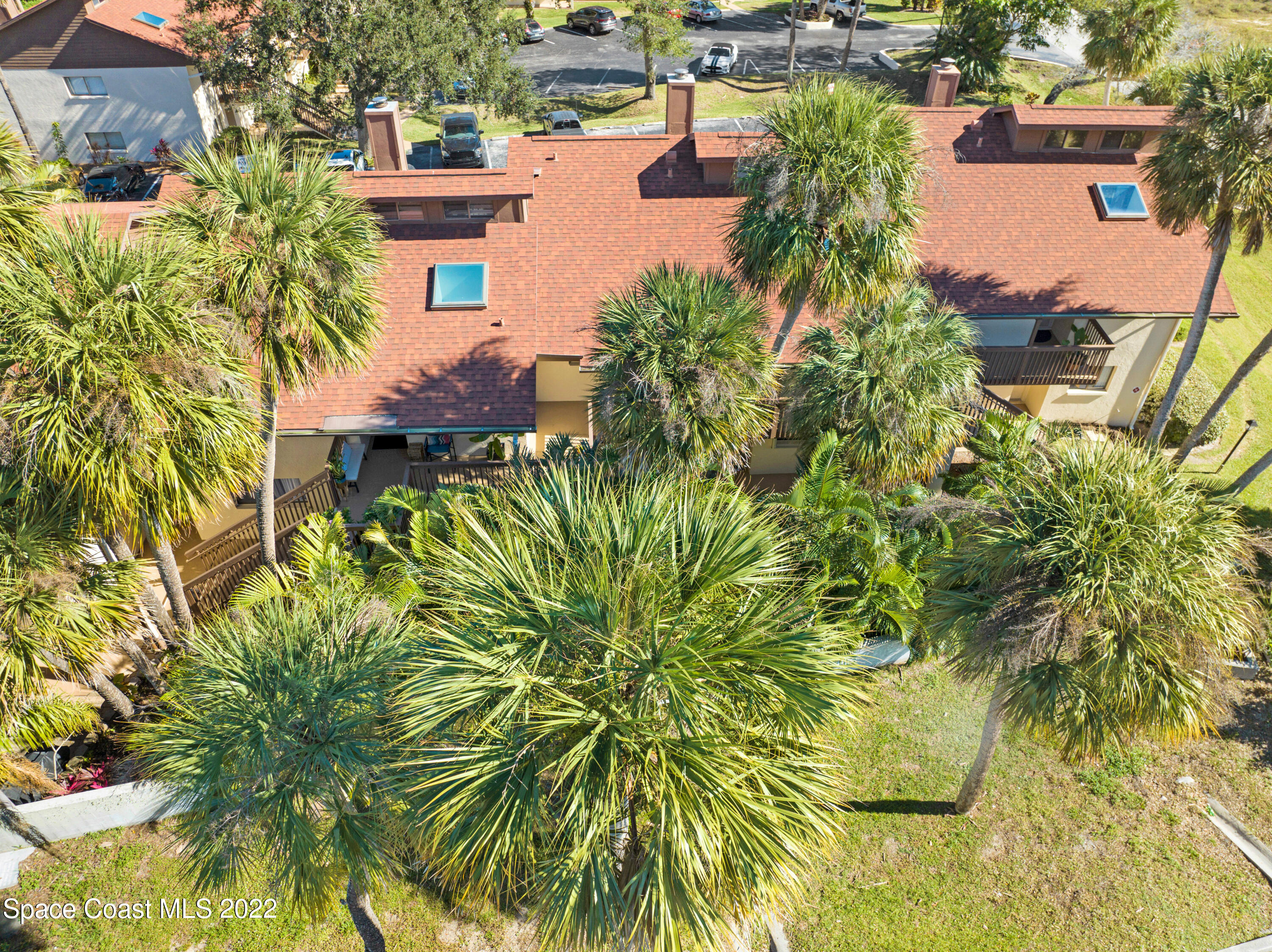 2929 Kirkland Road Northeast Palm Bay, FL 32905 - Photo 24 of 32 an aerial view of residential houses with outdoor space and trees