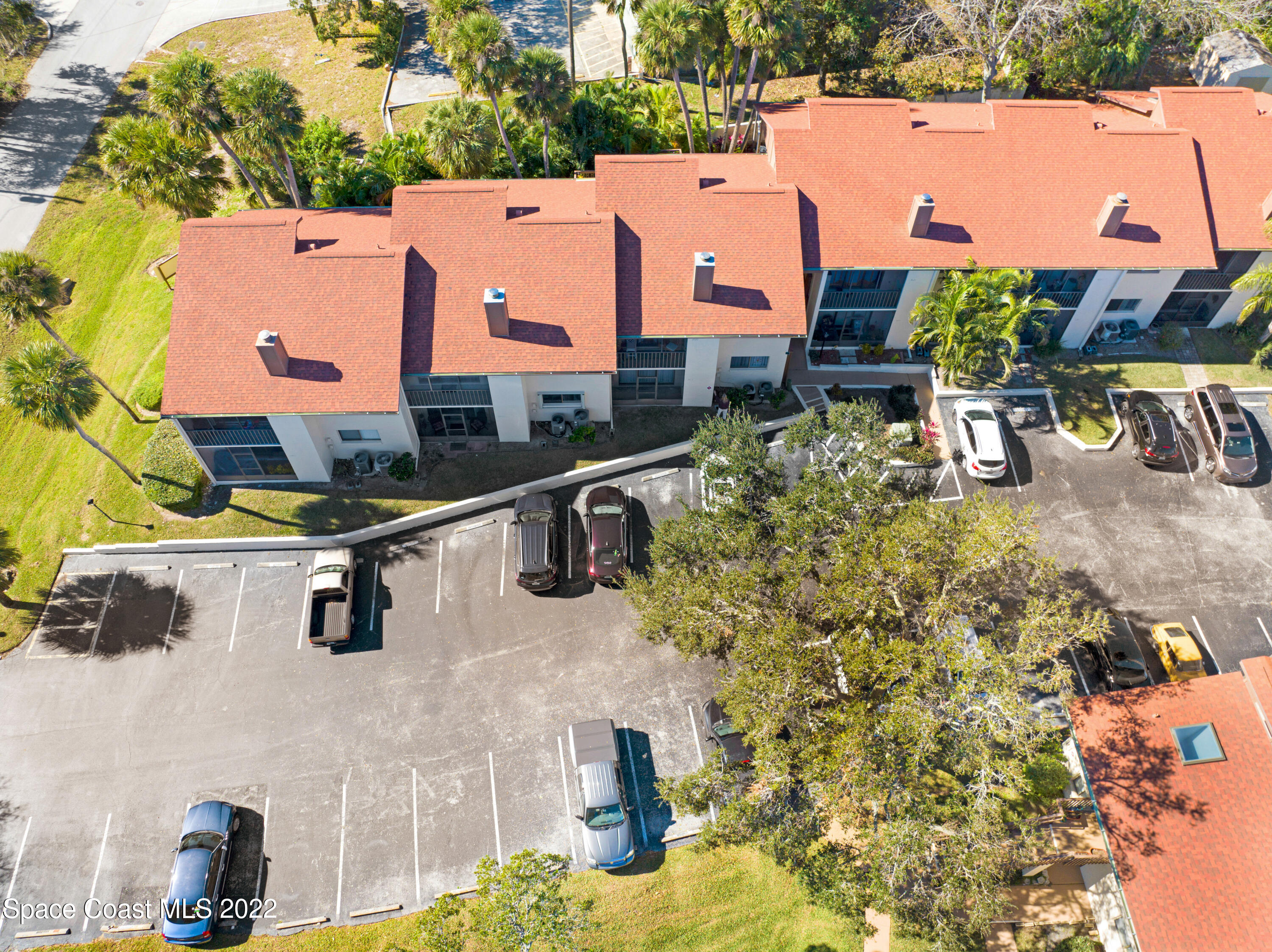 2929 Kirkland Road Northeast Palm Bay, FL 32905 - Photo 30 of 32 an aerial view of residential houses with outdoor space and trees all around