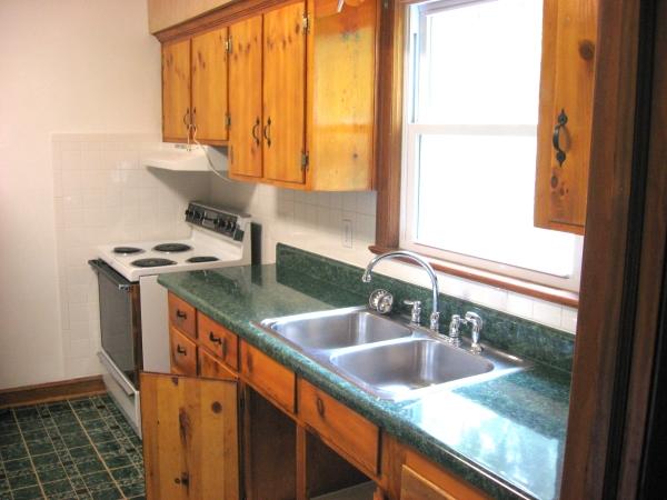 2031 Meadowbrook Road Northwest Roanoke, VA 24017 - Photo 3 of 5 a bathroom with a sink and a window