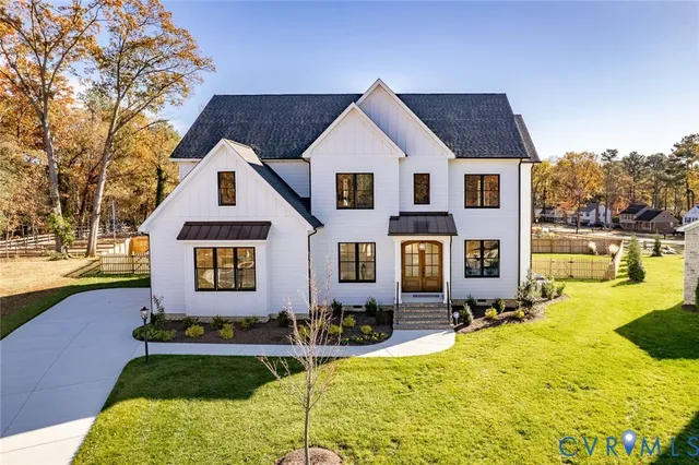 a view of a house with swimming pool and sitting area