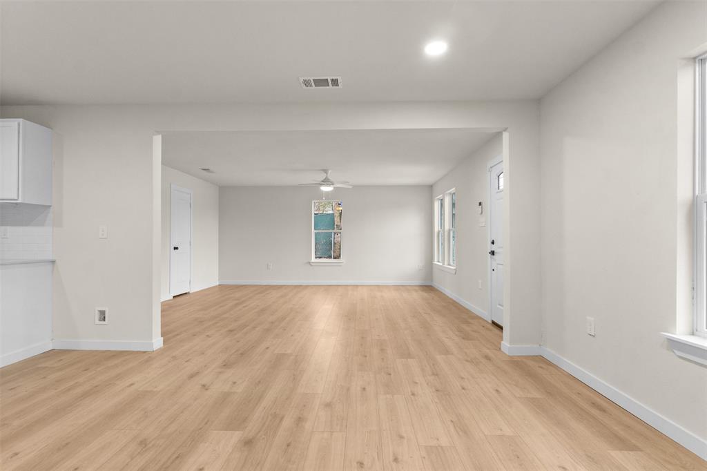3915 Coolidge Street Dallas, TX 75215 - Photo 11 of 33 wooden floor in an empty room