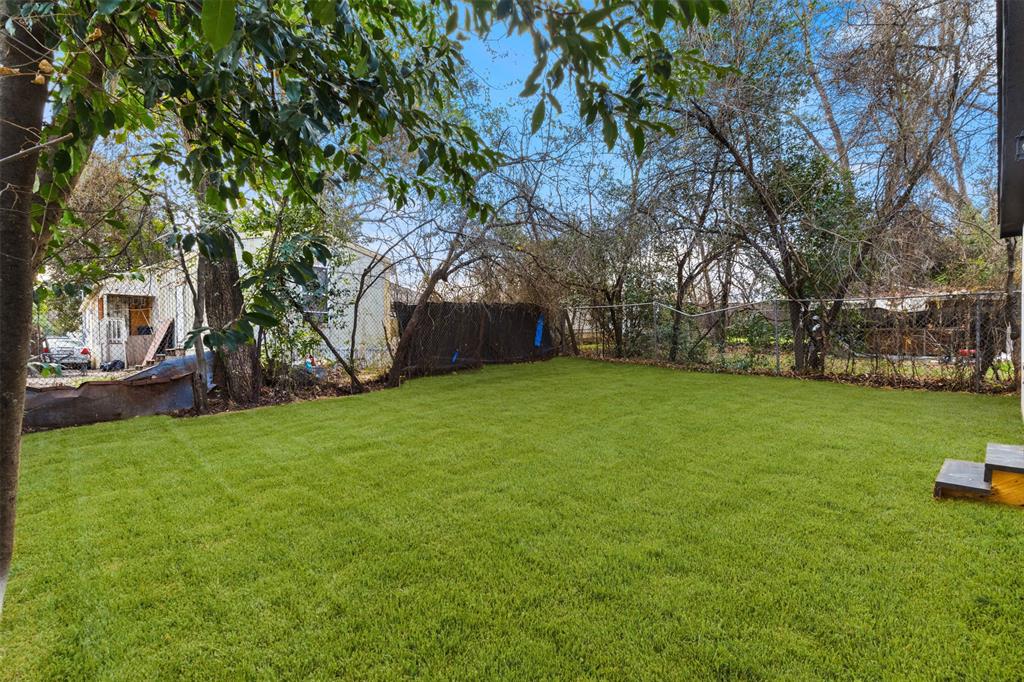 3915 Coolidge Street Dallas, TX 75215 - Photo 26 of 33 a view of a backyard with a garden