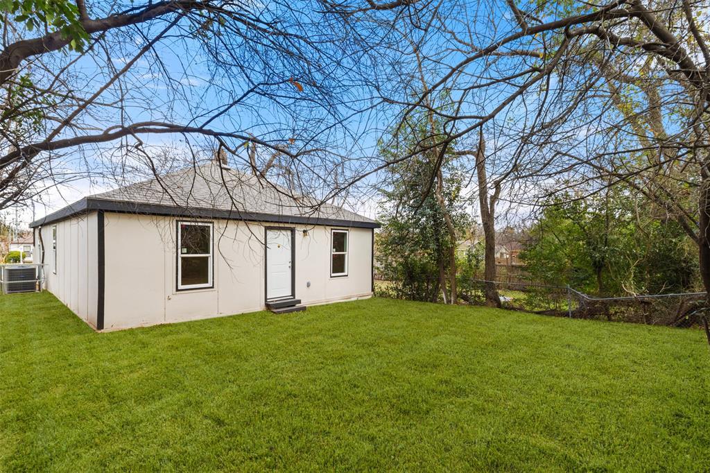 3915 Coolidge Street Dallas, TX 75215 - Photo 29 of 33 a view of a house with a yard