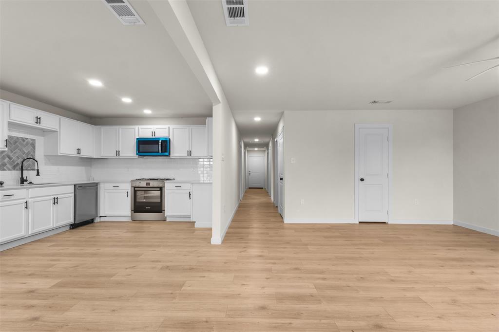 3915 Coolidge Street Dallas, TX 75215 - Photo 5 of 33 a view of kitchen with granite countertop cabinets and sink