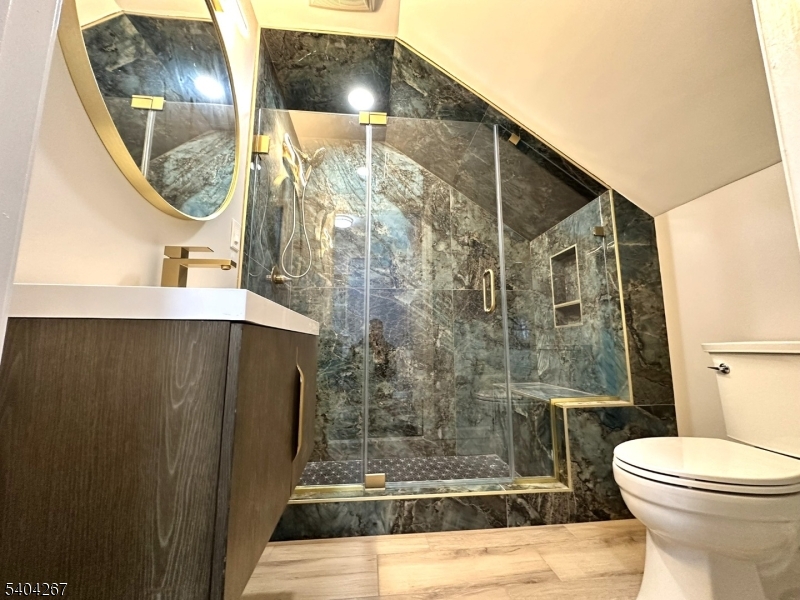 236 Kinnelon Road Kinnelon, NJ 07405 - Photo 15 of 22 a bathroom with a toilet and a mirror