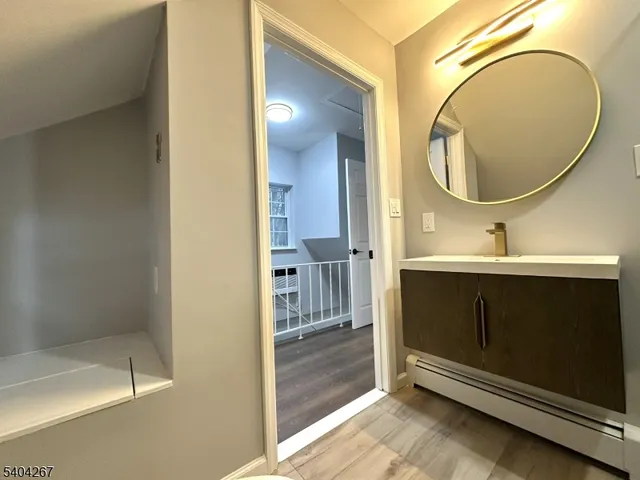 a view of a small house and a yard