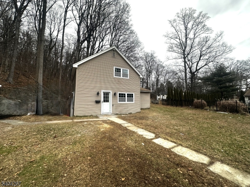 236 Kinnelon Road Kinnelon, NJ 07405 - Photo 21 of 22 a front view of a house with a yard