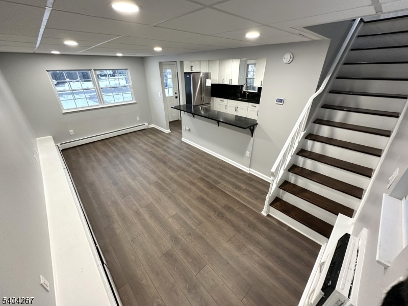 236 Kinnelon Road Kinnelon, NJ 07405 - Photo 3 of 22 wooden floor with staircase