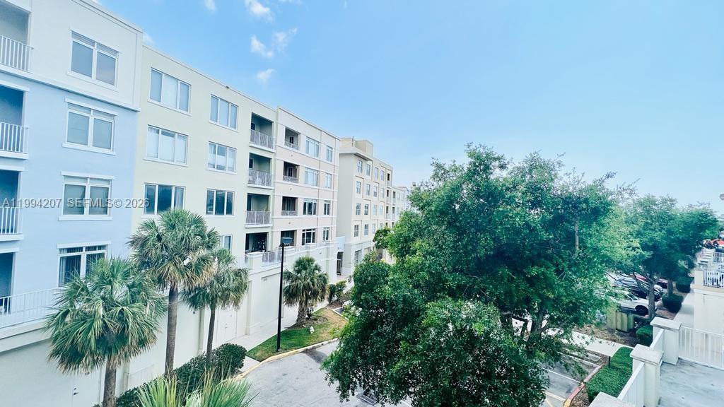 1209 Main Street, Unit 315 Jupiter, FL 33458 - Photo 17 of 18 a front view of a building