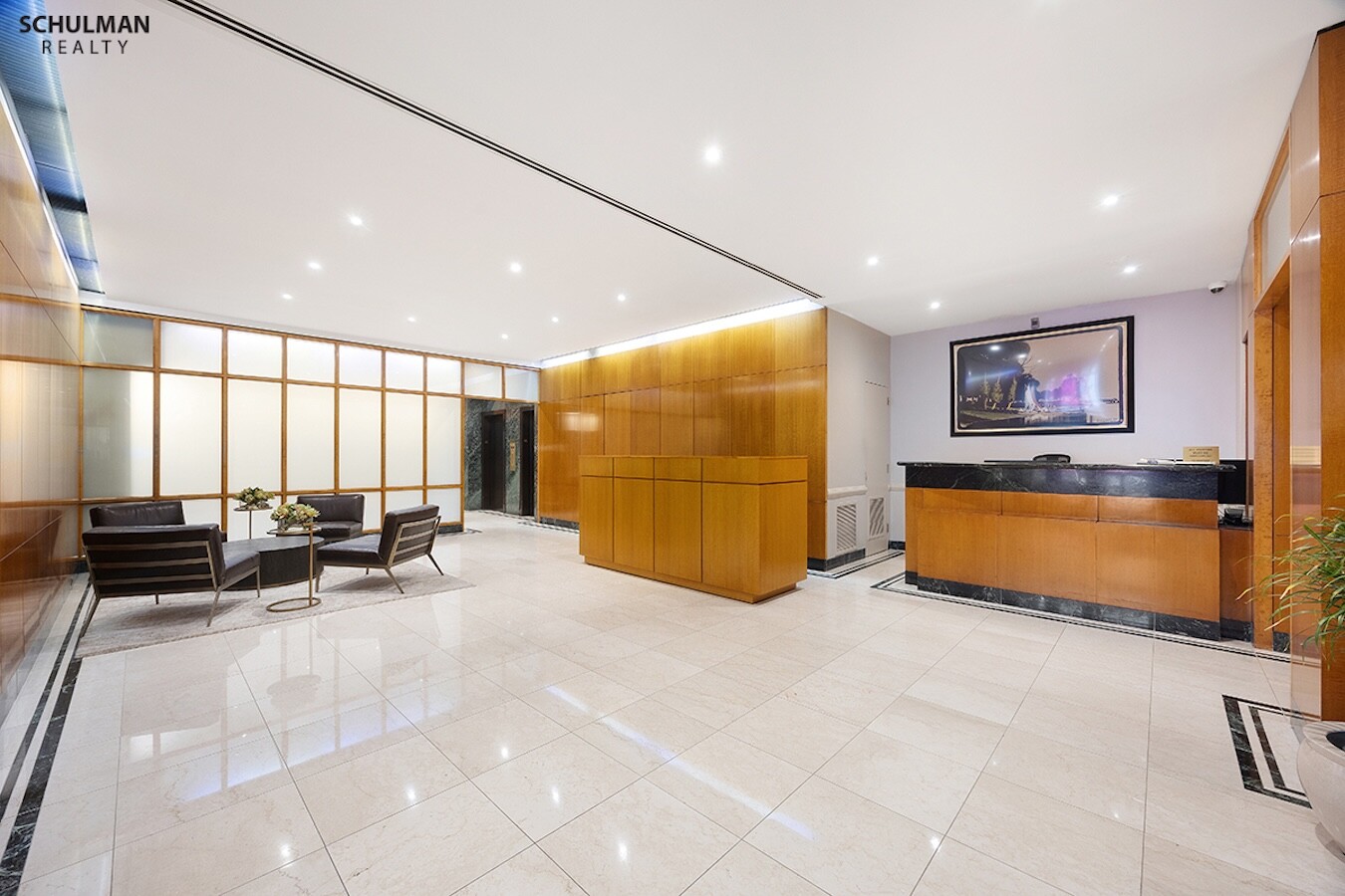 411 East 53rd Street, Unit 14F Manhattan, NY 10022 - Photo 18 of 20 a view of a lobby with furniture and a couch