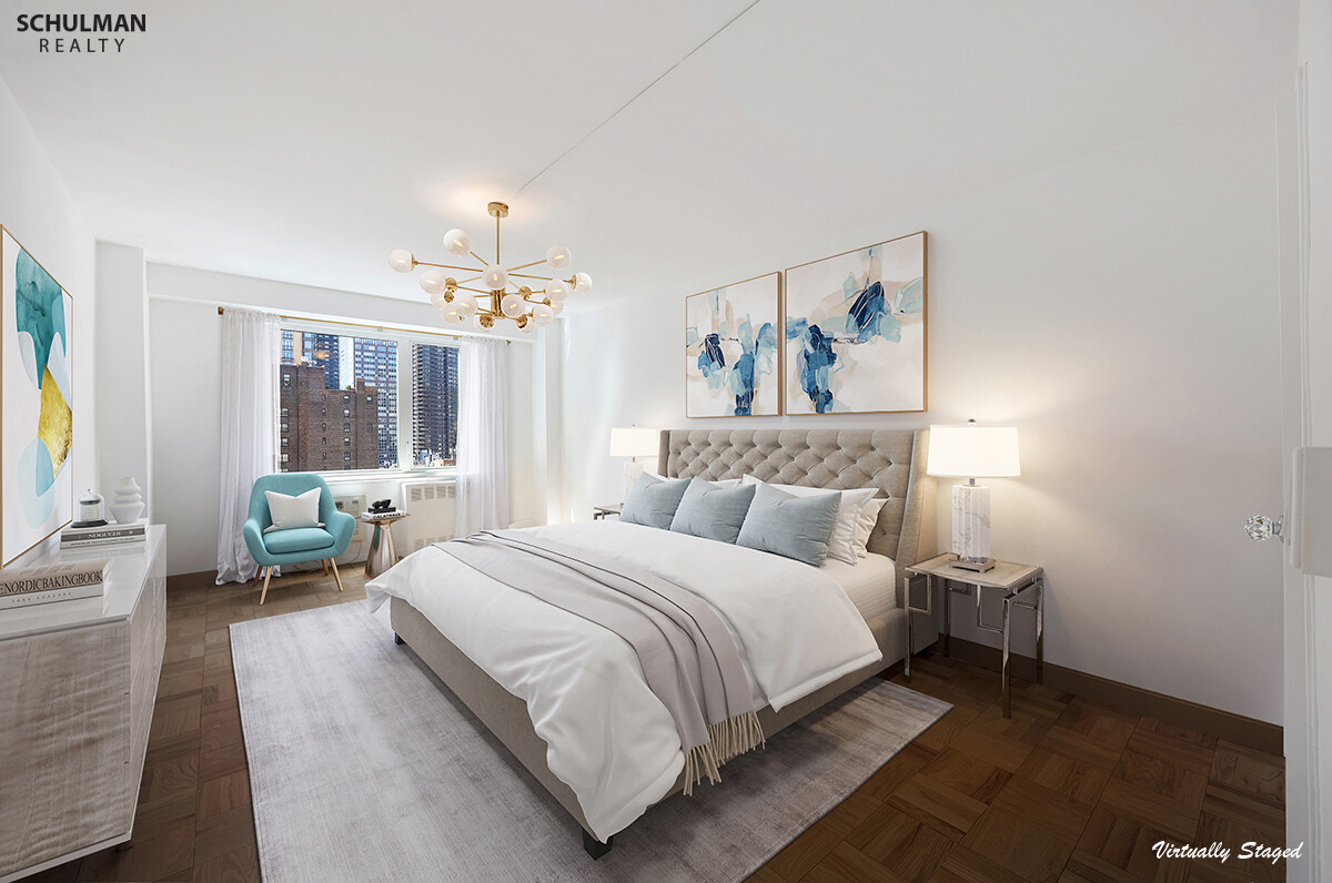411 East 53rd Street, Unit 14F Manhattan, NY 10022 - Photo 8 of 20 a bedroom with a bed a chandelier and window