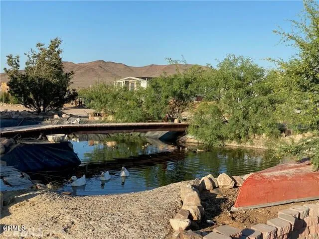 a bed room with a bed and a television